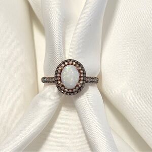 Effy Opal ring in 14k rose gold setting with cabochon opal and diamonds.
